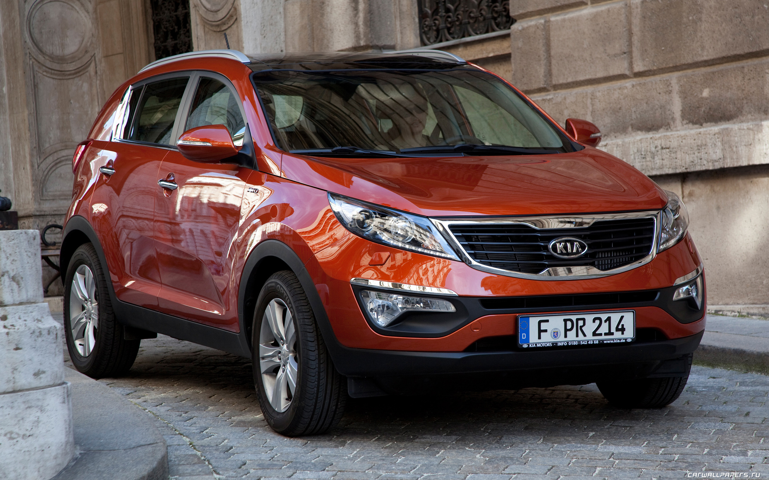 Kia Sportage 3 оранжевый